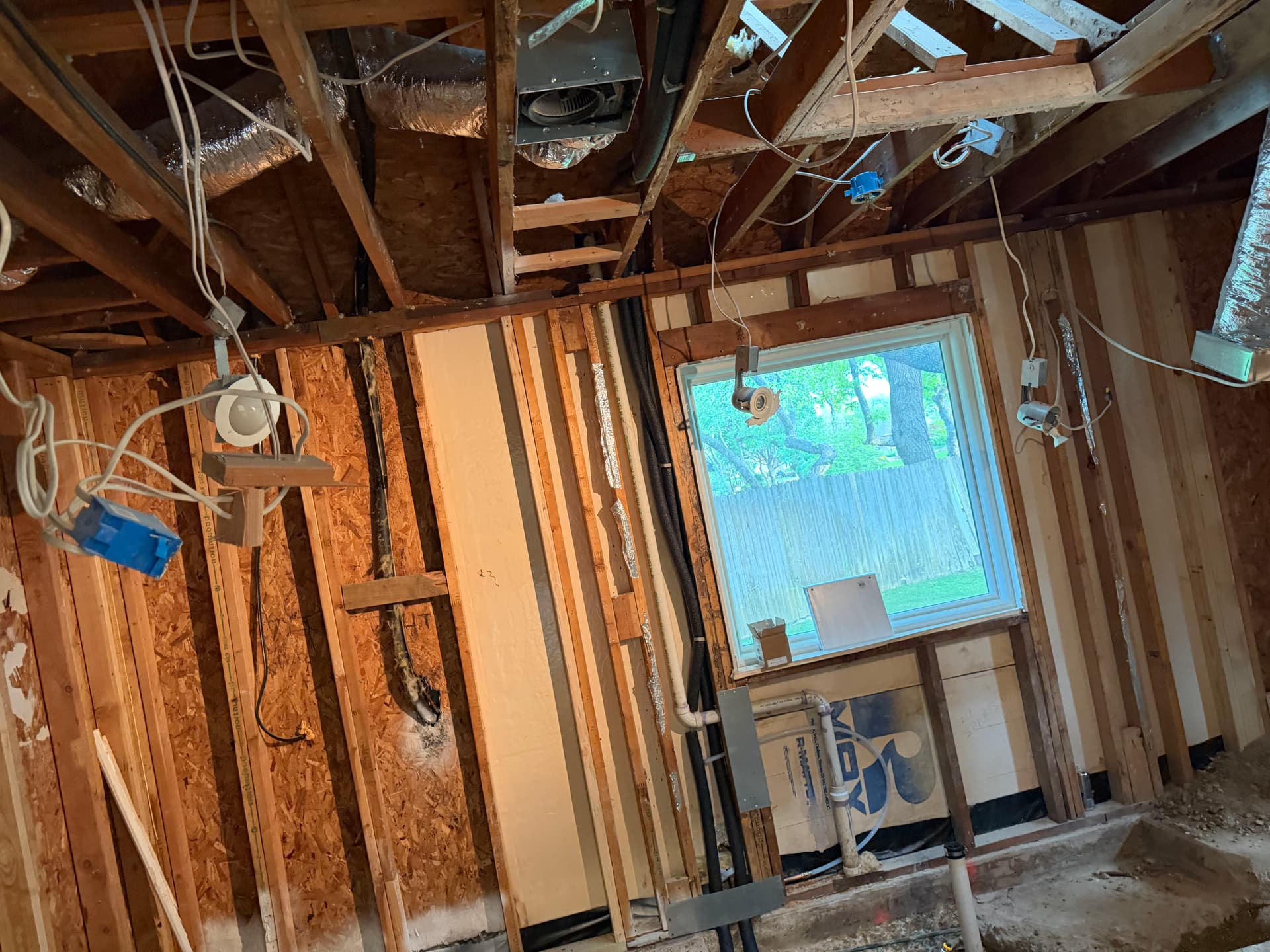 Gallery photos for Inside a Bathroom Remodel Before the Walls Close Up: Image #2
