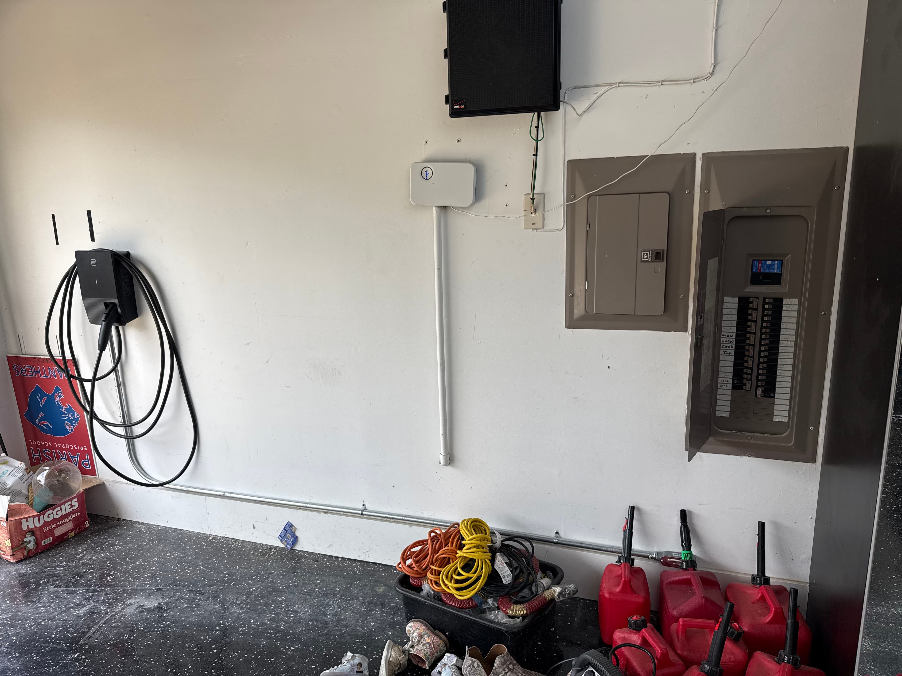 Project Clean EV Charger Install with Conduit Run in Garage image