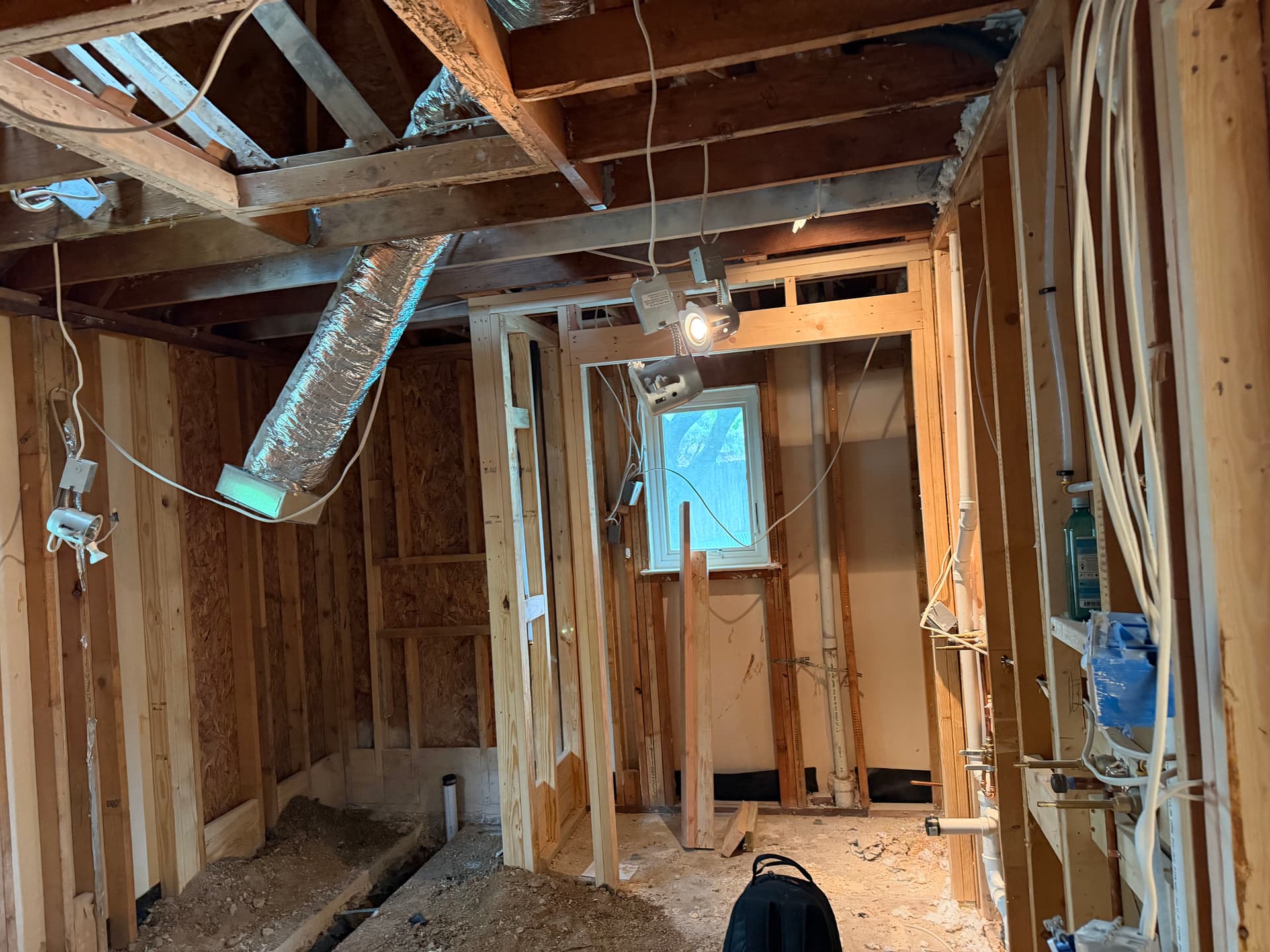 Gallery photos for Inside a Bathroom Remodel Before the Walls Close Up: Image #3