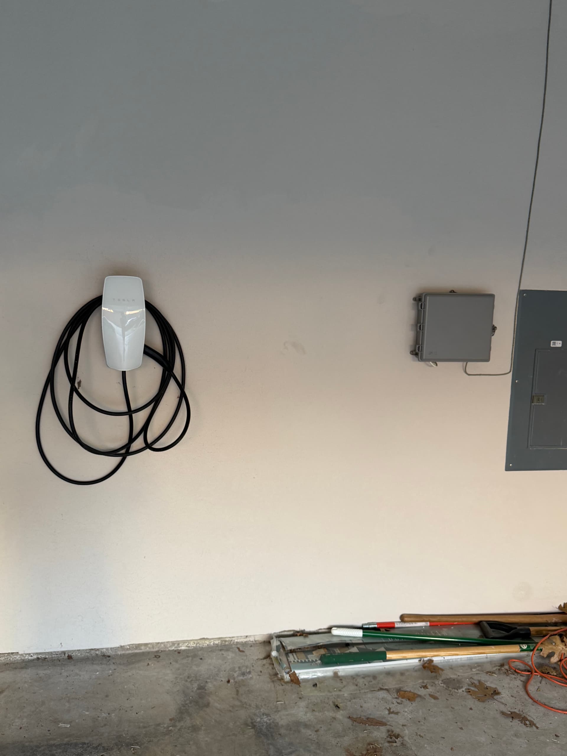 One Universal Tesla Charger Keeping Two EVs Powered Up image
